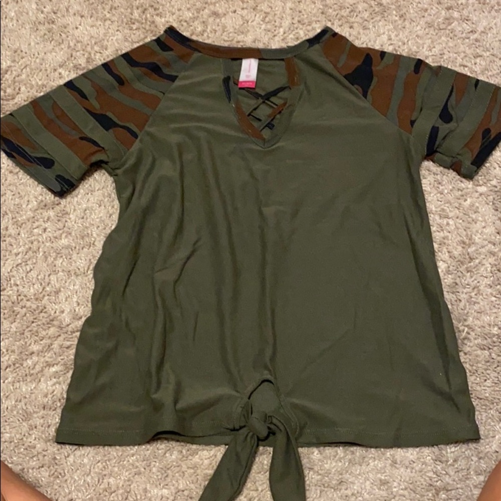 green black and brown tee with chest cross